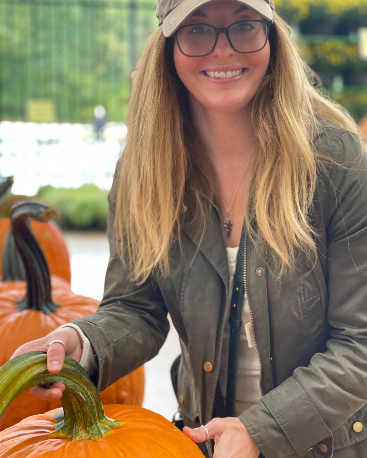 Victoria Baker, founder of La Belle Vine, picking out pumpkins